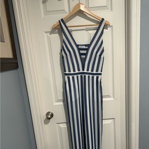 Bebe Stripped jumpsuit.